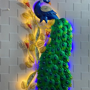 peacock on a branch metal wall art